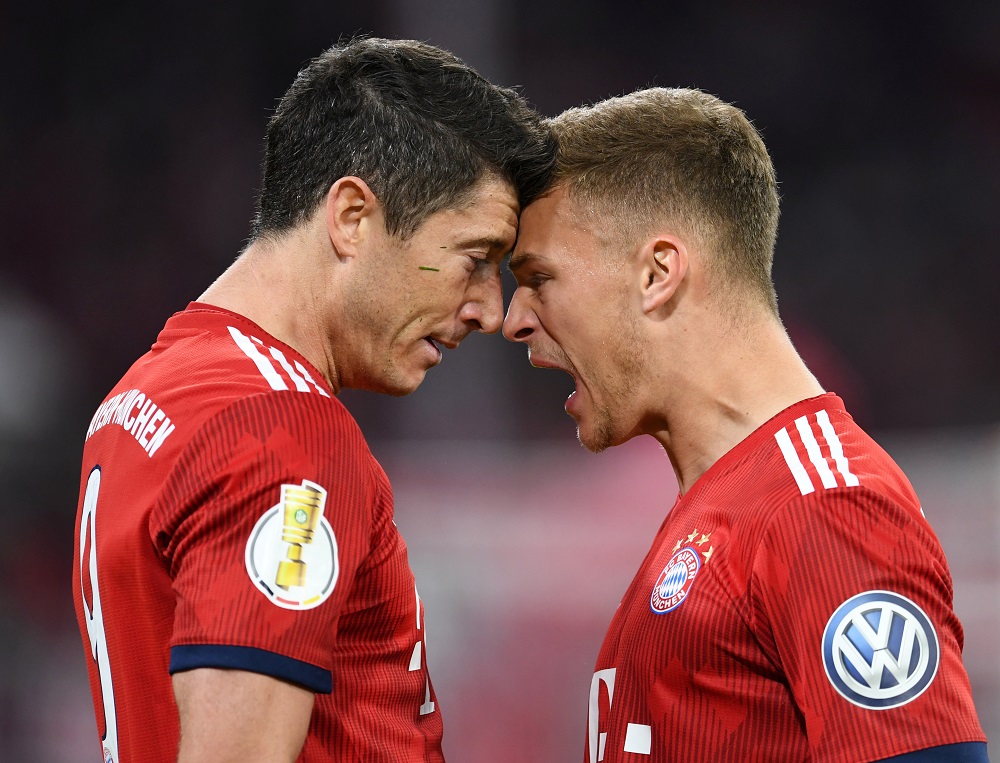 Bayern Munich'sRobert Lewandowski celebrates scoring their fifth goal with Joshua Kimmich at the Allianz Arena in Munich April 3, 2019. u00e2u20acu201d Reuters pic