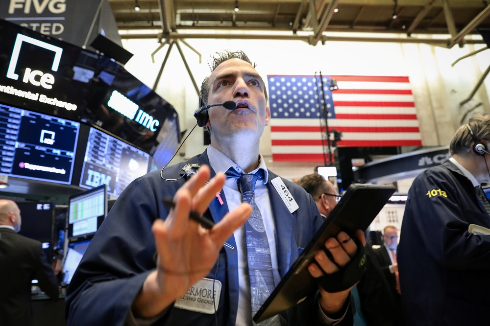 Traders work on the floor at the New York Stock Exchange April 4, 2019. u00e2u20acu201d Reuters pic
