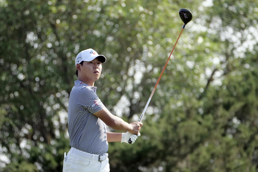 Kim Si-woo watches his drive on the 15th hole during the second round of the Valero Texas Open golf tournament in San Antonio April 5, 2019. u00e2u20acu201d Picture by Soobum Im-USA TODAY Sports  via Reuters