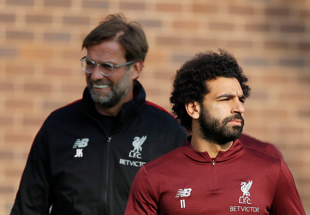 Liverpoolu00e2u20acu2122s Mohamed Salah and manager Jurgen Klopp are seen during training in Liverpool April 8, 2019. u00e2u20acu201d Action Images pic via Reuters