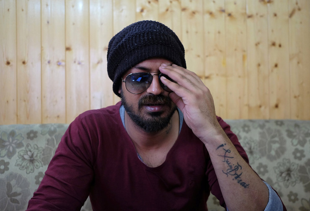 Zohaib Butt, a Kashmiri freelance photojournalist, speaks during an interview with Reuters in Srinagar March 23, 2019. — Reuters pic