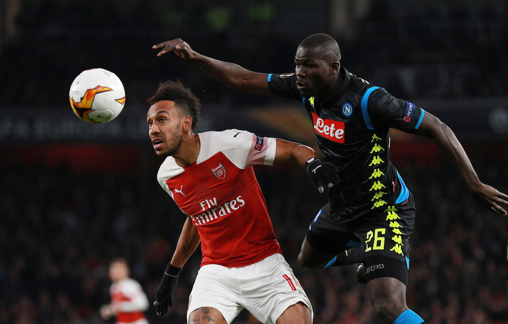Arsenalu00e2u20acu2122s Pierre-Emerick Aubameyang in action with Napoliu00e2u20acu2122s Kalidou Koulibaly during their Europa League Quarter Final First Leg match at Emirates Stadium in London April 11, 2019. u00e2u20acu201d Reuters pic