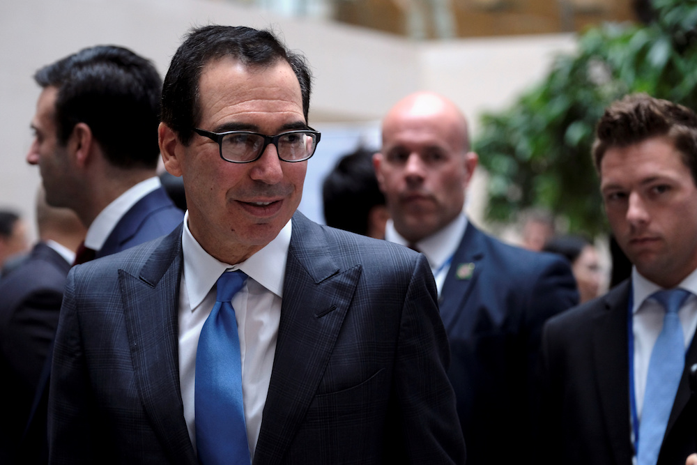 US Treasury Secretary Steven Mnuchin leaves the G-20 Finance Ministers and Central Bank Governorsu00e2u20acu2122 meeting at the IMF and World Banku00e2u20acu2122s 2019 Annual Spring Meetings, in Washington, April 12, 2019. u00e2u20acu201d Reuters