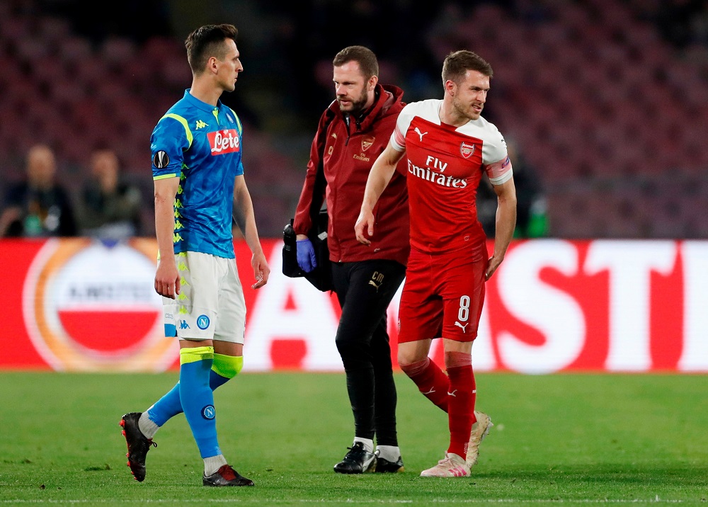 Arsenal's Aaron Ramsey as he walks off to be substituted after sustaining an injury at Stadio San Paolo in Naples April 18, 2019. u00e2u20acu201d Action Images via Reuters