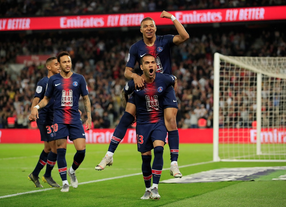 Paris St Germainu00e2u20acu2122s Kylian Mbappe celebrates scoring their third goal and completing his hat-trick with Dani Alves at the Parc des Princes stadium in Paris April 21, 2019. u00e2u20acu201d Reuters pic