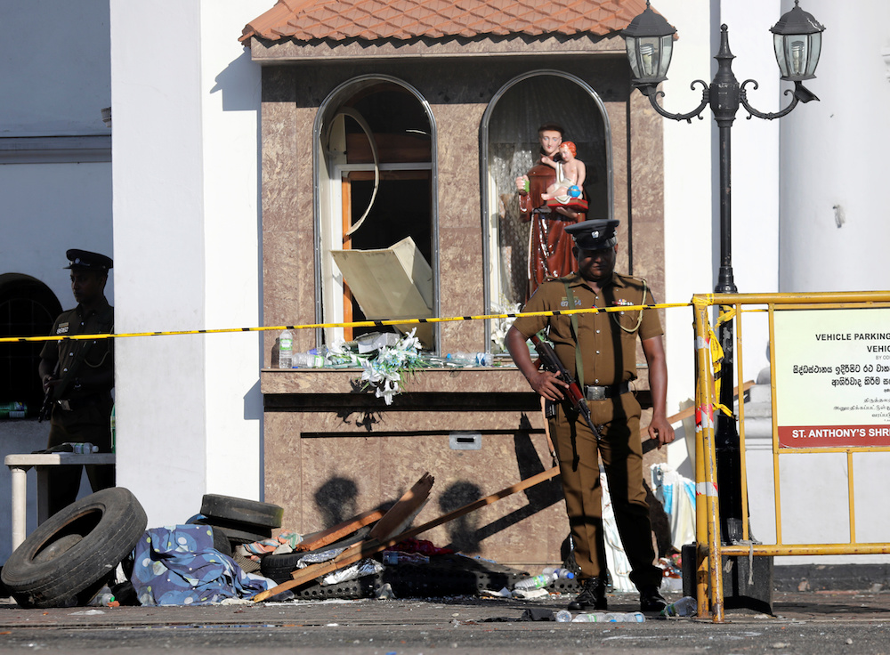 Police officers guard St Anthonyu00e2u20acu2122s Shrine in Colombo, after bomb blasts ripped through churches and luxury hotels on Easter, in Sri Lanka April 22, 2019. u00e2u20acu201d Reuters pic