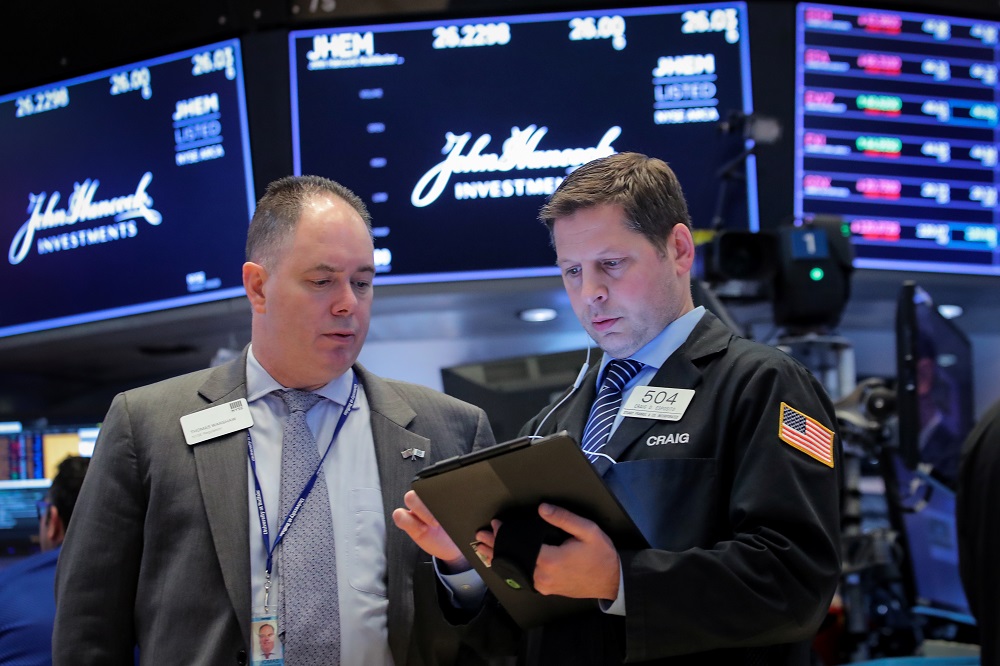 Traders work on the floor at the New York Stock Exchange April 24, 2019. u00e2u20acu201d Reuters pic