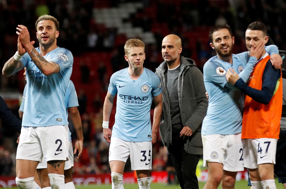Manchester City manager Pep Guardiola and Oleksandr Zinchenko after the match at Old Trafford in Manchester April 24, 2019. u00e2u20acu201d Action Images via Reuters