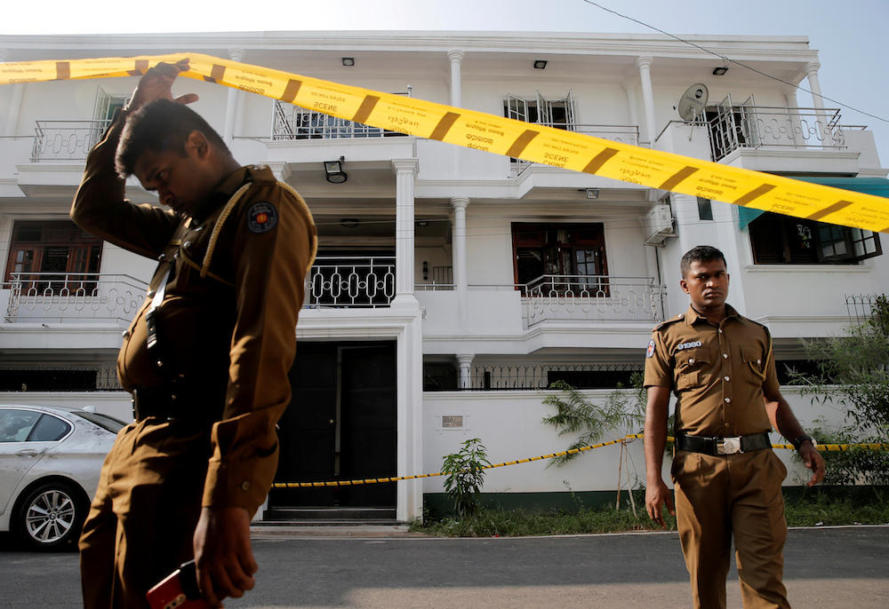 Police keep watch outside the family home of a bomber suspect where an explosion occurred during a Special Task Force raid, following a string of suicide attacks on churches and luxury hotels, in Colombo April 25, 2019. u00e2u20acu201d Reuters pic