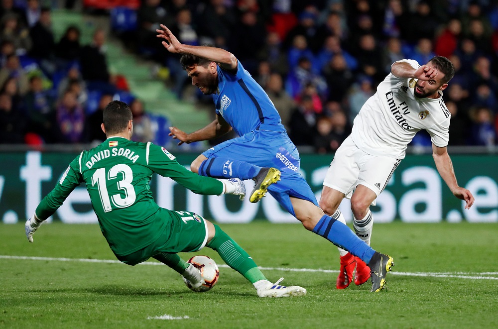 Getafeu00e2u20acu2122s Leandro Cabrera and David Soria in action with Real Madridu00e2u20acu2122s Dani Carvajal during their match at the Coliseum Alfonso Perez in Getafe April 25, 2019. u00e2u20acu201d Reuters pic