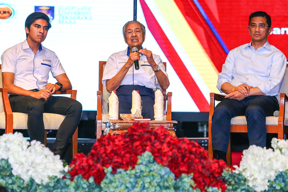 Syed Saddiq Abdul Rahman, Tun Dr Mahathir Mohamad and Datuk Seri Azmin Ali participate in a question-and-answer session after the launch of the Asian Tiger Initiative at UiTM Shah Alam April 1, 2019. u00e2u20acu201d Picture by Hari Anggara