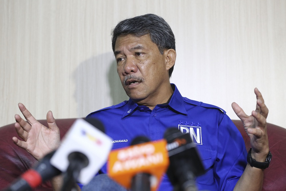 Barisan Nasional candidate for the Rantau by-election, Datuk Seri Mohamad Hasan, speaks during a press conference at Barisan Nasional command centre in Rantau April 1, 2019. u00e2u20acu201d Picture by Yusof Mat Isa