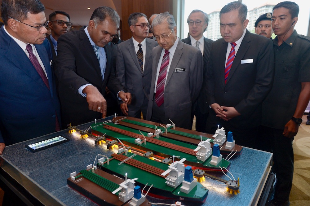 Prime Minister Tun Dr Mahathir Mohamad looks at a scale model of the worldu00e2u20acu2122s largest Ship-to-Ship Transfer Hub (STS Hub) in Putrajaya April 2, 2019. u00e2u20acu201d Picture by Mukhriz Hazim