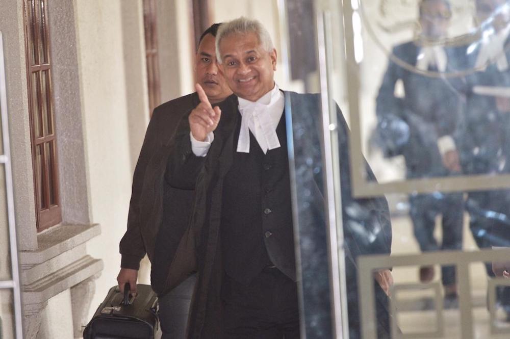 Attorney General Tommy Thomas arrives at the Kuala Lumpur Court Complex April 3, 2019. u00e2u20acu201d Picture by Mukhriz Hazim
