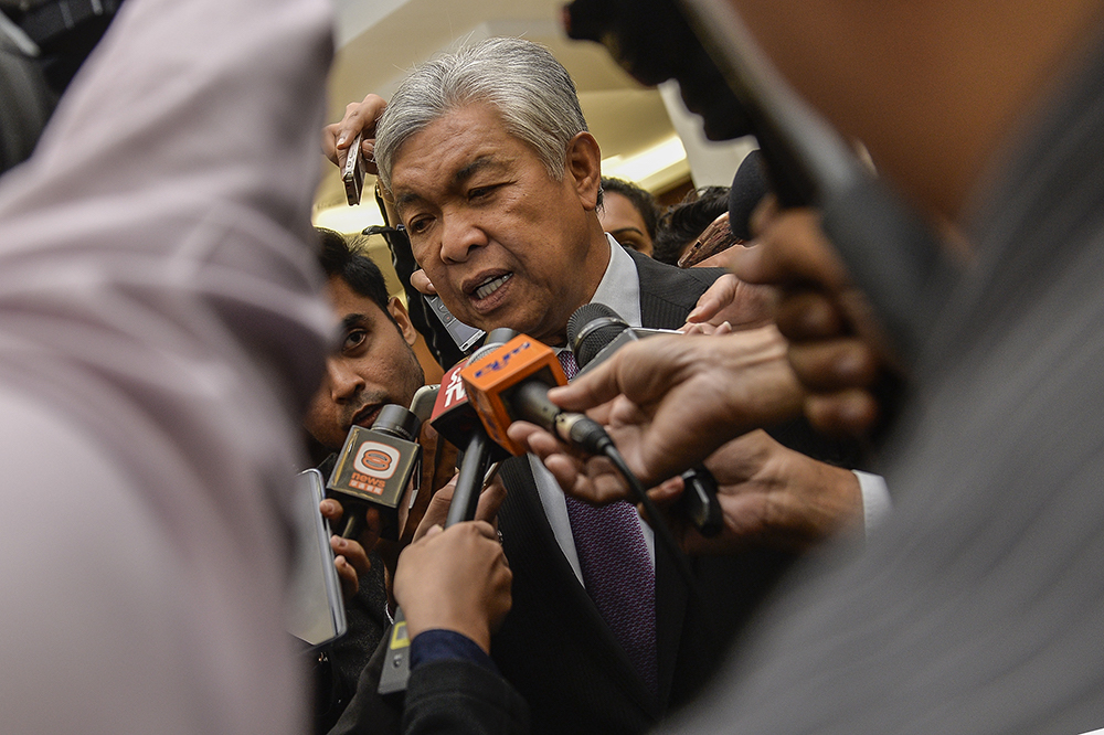 Datuk Seri Ahmad Zahid Hamidi speaks to reporters in Parliament in Kuala Lumpur April 3, 2019. u00e2u20acu201d Picture by Miera Zulyana