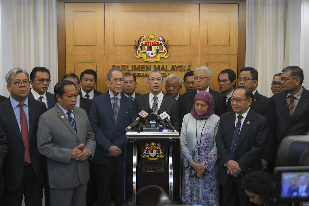 Datuk Seri Fadillah Yusof (centre) speaks during a press conference in Parliament April 4, 2019. u00e2u20acu201d Picture by Yusof Mat Isa