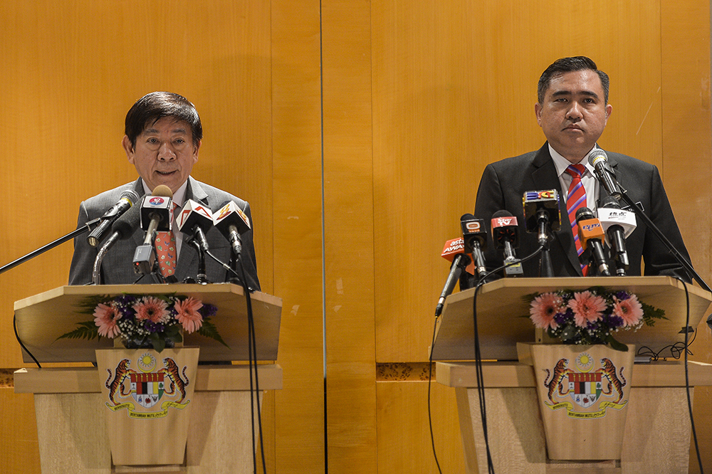Transport Minister Anthony Loke Siew Fook and Singaporeu00e2u20acu2122s Minister of Transport Khaw Boon Wan during a press conference in Sepang April 8, 2019. u00e2u20acu201d Picture by Miera Zulyana