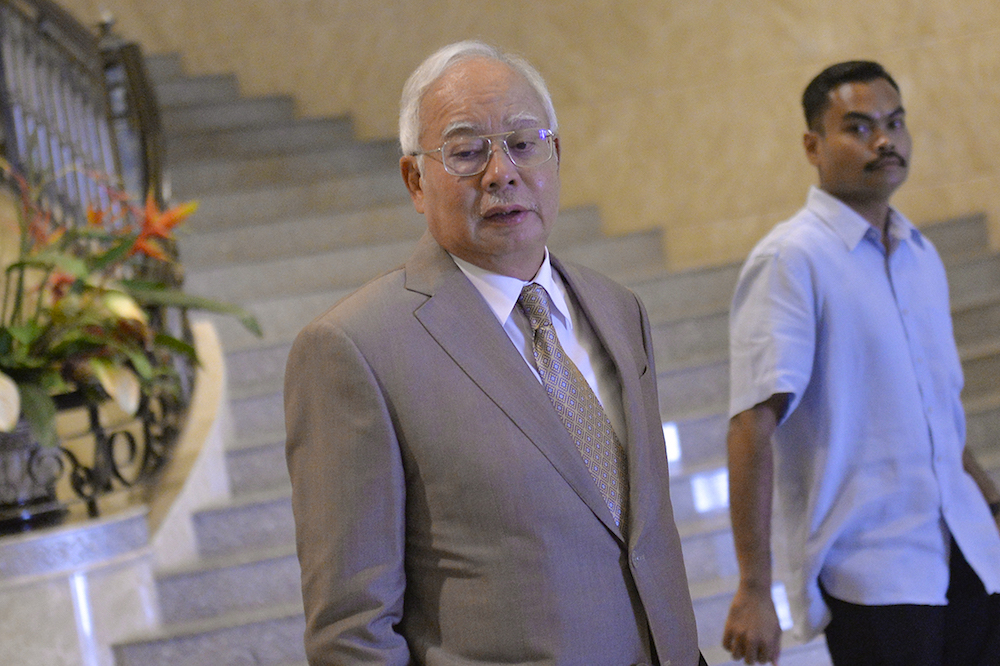 Datuk Seri Najib Razak arrives at the Court of Appeal in Putrajaya April 10, 2019. u00e2u20acu201d Picture by Mukhriz Hazim