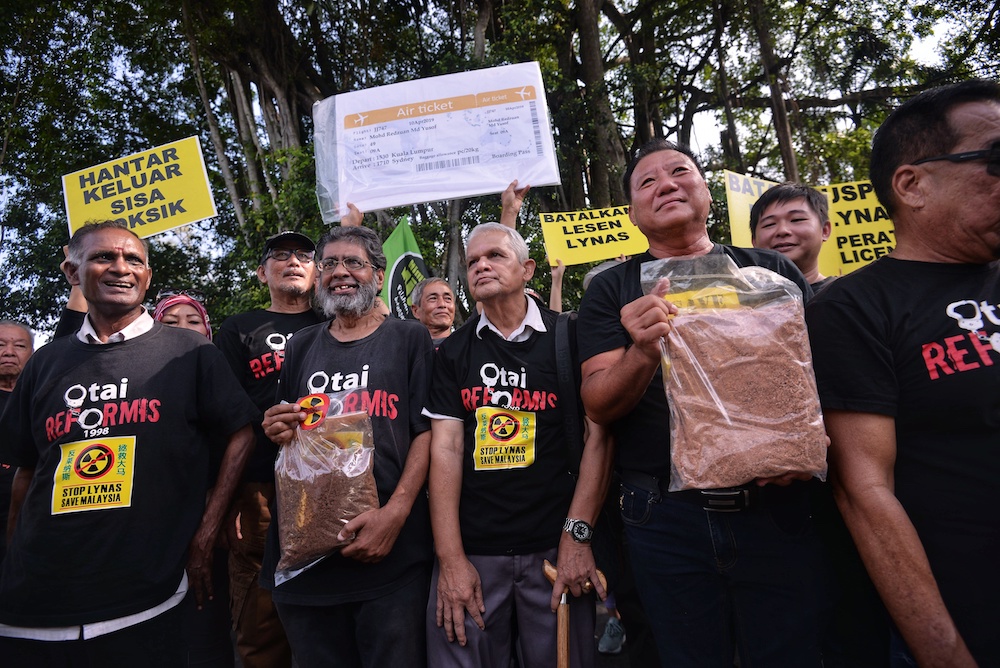 Anti-Lynas demonstrators rally in front of Parliament compound in Kuala Lumpur April 10, 2019. u00e2u20acu201d Picture by Shafwan Zaidon
