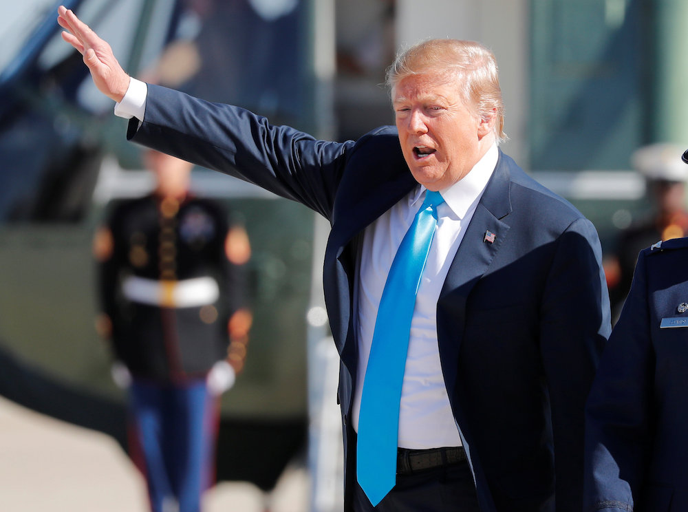 US President Donald Trump waves as he departs Washington on travel to Texas at Joint Base Andrews, Maryland April 10, 2019. u00e2u20acu201d Reuters picnn