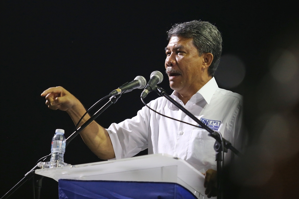 Barisan Nasionalu00e2u20acu2122s Rantau candidate Datuk Seri Mohamad Hasan speaks during the Ceramah Perdana Barisan Nasional in Rantau April 11, 2019. u00e2u20acu201d Picture by Ahmad Zamzahuri