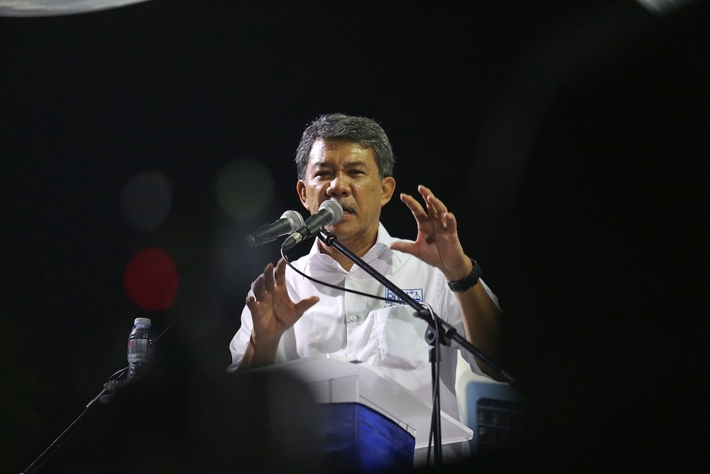 Barisan Nasionalu00e2u20acu2122s Rantau candidate Datuk Seri Mohamad Hasan speaks during the Ceramah Perdana Barisan Nasional in Rantau April 11, 2019. u00e2u20acu201d Picture by Ahmad Zamzahuri