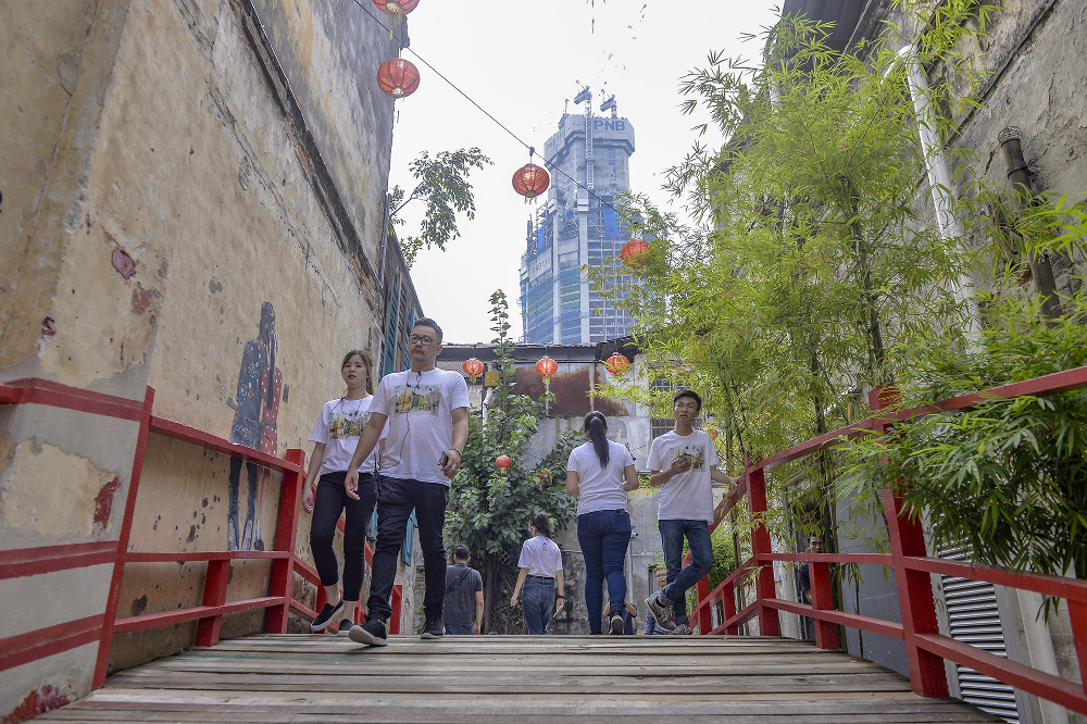 Fancy stepping back into time? Watch out for a mural as you cross the red bridge. 