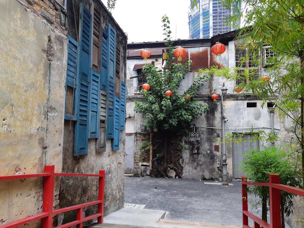 A view of the original wooden window shutters on display and what is believed to be one of the oldest lamppost in Kuala Lumpur. 
