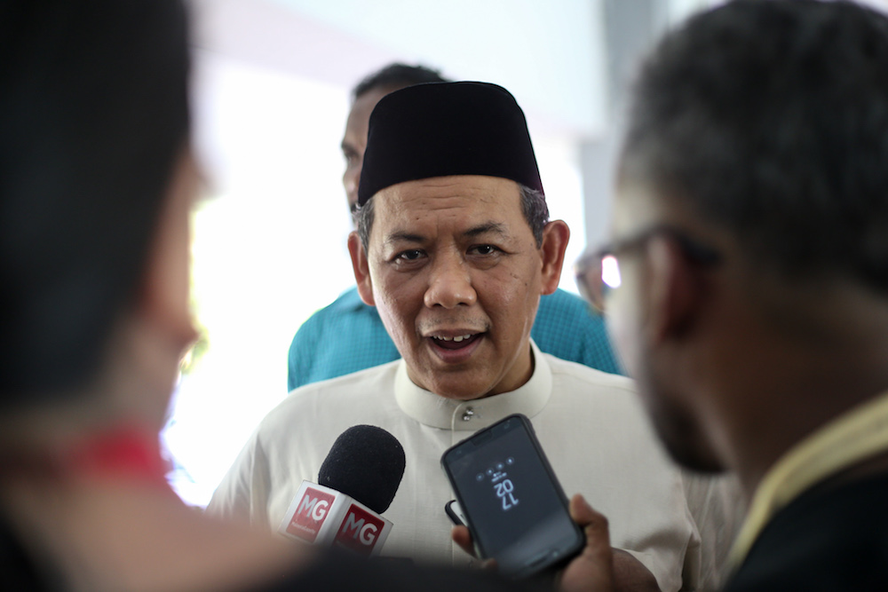 Negri Sembilan Mentri Besar Aminuddin Harun speaks to reporters ahead of the Rantau by-election in Seremban April 12, 2019. u00e2u20acu201d Picture by Ahmad Zamzahuri