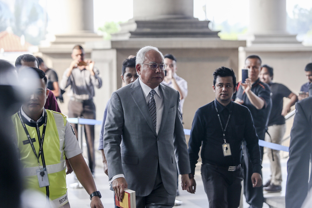 Datuk Seri Najib Razak arrives at the Kuala Lumpur Court Complex April 16, 2019. u00e2u20acu201d Picture by Firdaus Latif
