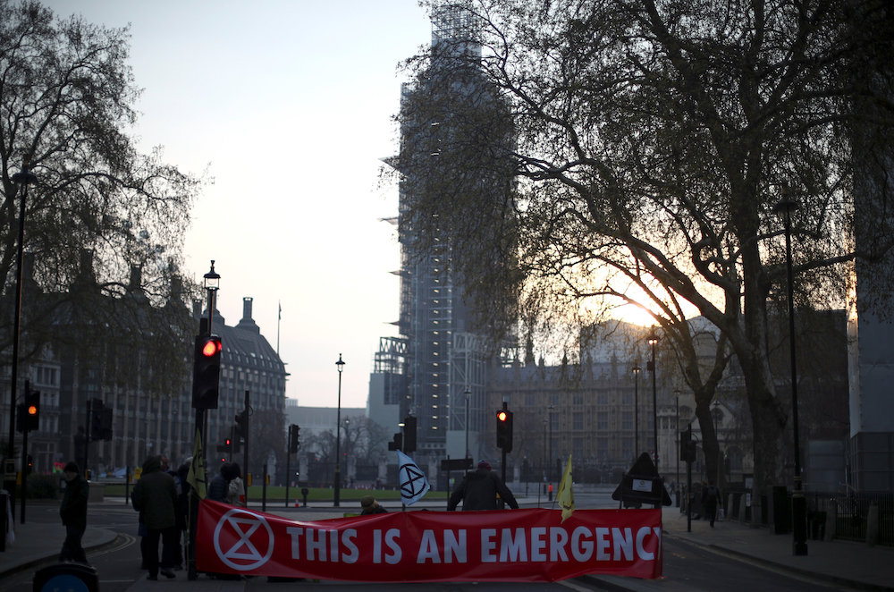 Climate change activists block a road during the Extinction Rebellion protest at Parliament Square in London, Britain April 16, 2019. u00e2u20acu201d Reuters pic