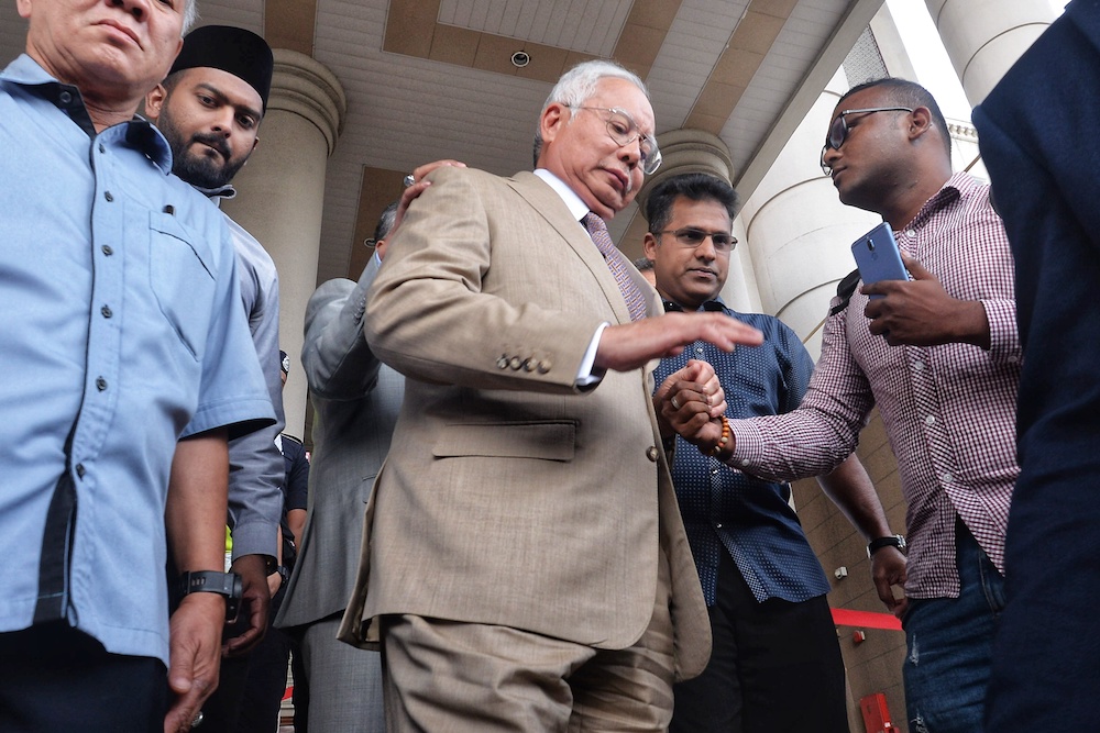Datuk Seri Najib Razak leaves the Kuala Lumpur Court Complex April 17, 2019. u00e2u20acu201d Picture by Shafwan Zaidon