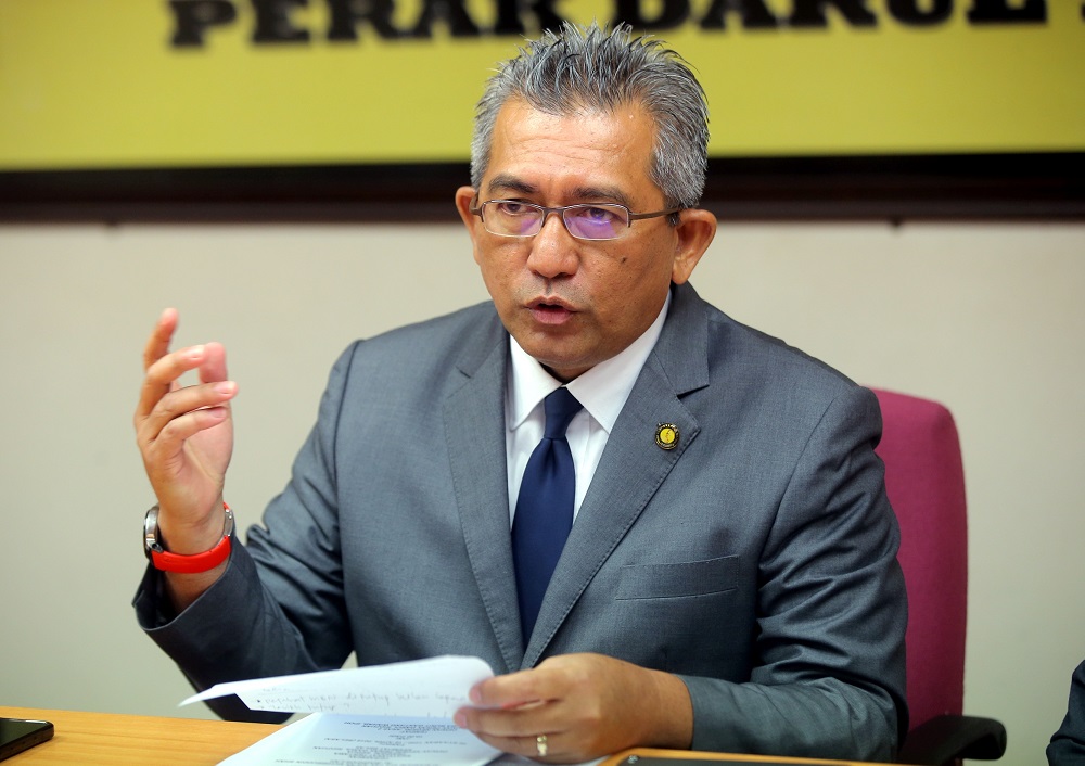 Rungkup assemblyman Datuk Shahrul Zaman Yahya speaks during a press conference in Ipoh April 18, 2019. u00e2u20acu201d Picture by Farhan Najib