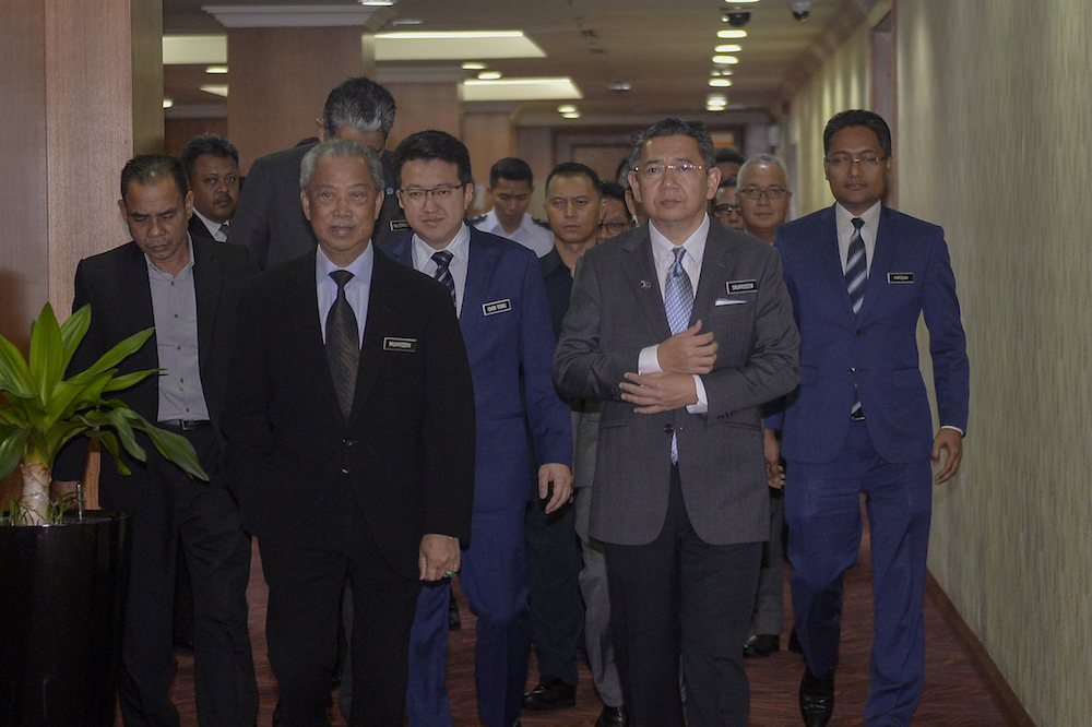 Tan Sri Muhyiddin Yassin, Liew Chin Tong and Datuk Salahuddin Ayub arrive for a press conference in Putrajaya April 24, 2019. u00e2u20acu201d Picture by Mukhriz Hazim