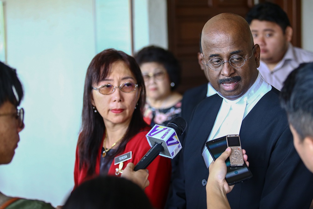 Minister of Primary Industries Teresa Kok (left) and her lawyer SN Nair at the Duta High Court in Kuala Lumpur April 29, 2019. u00e2u20acu201d Picture by Hari Anggara