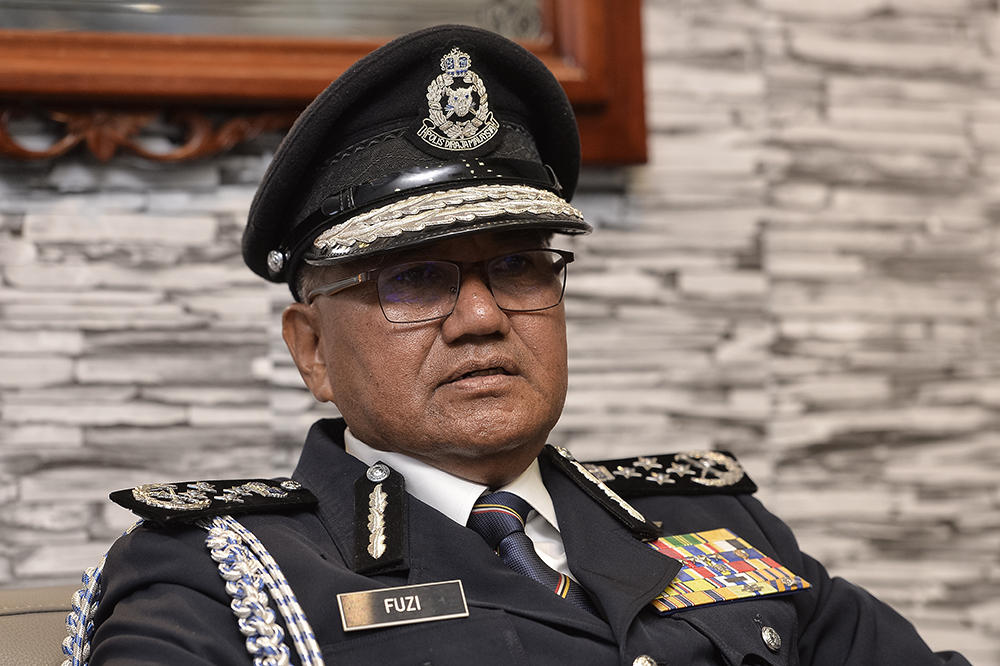 Inspector-General of Police, Tan Sri Datuk Seri Mohamad Fuzi Harun, speaks during a press conference at the launch of the Brickfields District Police Headquarter in Kuala Lumpur April 29, 2019. u00e2u20acu201d Picture by Miera Zulyana