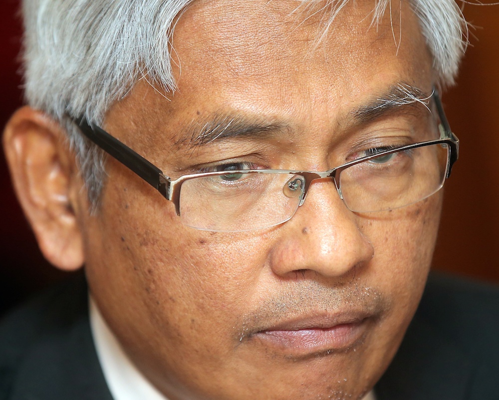 Perak DAP vice-chairman Abdul Aziz Bari speaks to reporters in Ipoh April 23, 2019. u00e2u20acu201d Picture by Farhan Najib