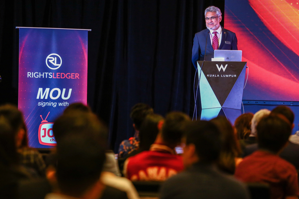 Federal Territories Minister Khalid Abdul Samad speaks after witnessing the signing of the memorandum of understanding between RightsLedger and Jom Channel at W Hotel April 30, 2019. u00e2u20acu201d Picture by Hari Anggara