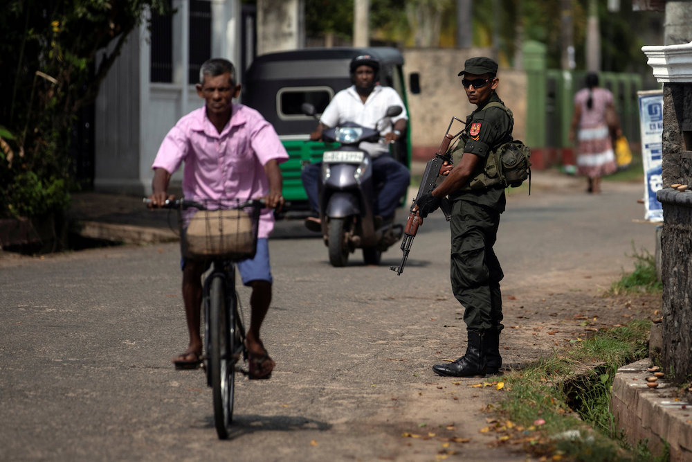 A soldier stands guard outside St. Sebastian Church, days after a string of suicide bomb attacks across the island on Easter Sunday, in Negombo, Sri Lanka May 1, 2019. u00e2u20acu201d Reuters picnn