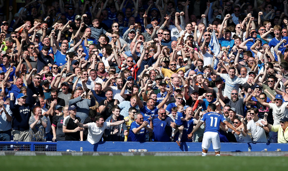 Evertonu00e2u20acu2122s Theo Walcott celebrates scoring their fourth goal with fans during the Premier League Everton v Manchester United at Goodison Park, Liverpool, Britain April 21, 2019. u00e2u20acu201d Reuters pic  