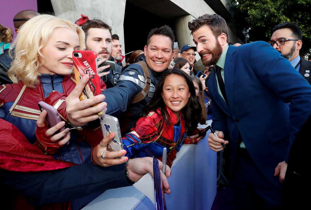 Cast member Chris Evans poses with fans on the red carpet at the world premiere of the film ‘The Avengers: Endgame’ in Los Angeles, California April 22, 2019. — Reuters pic
