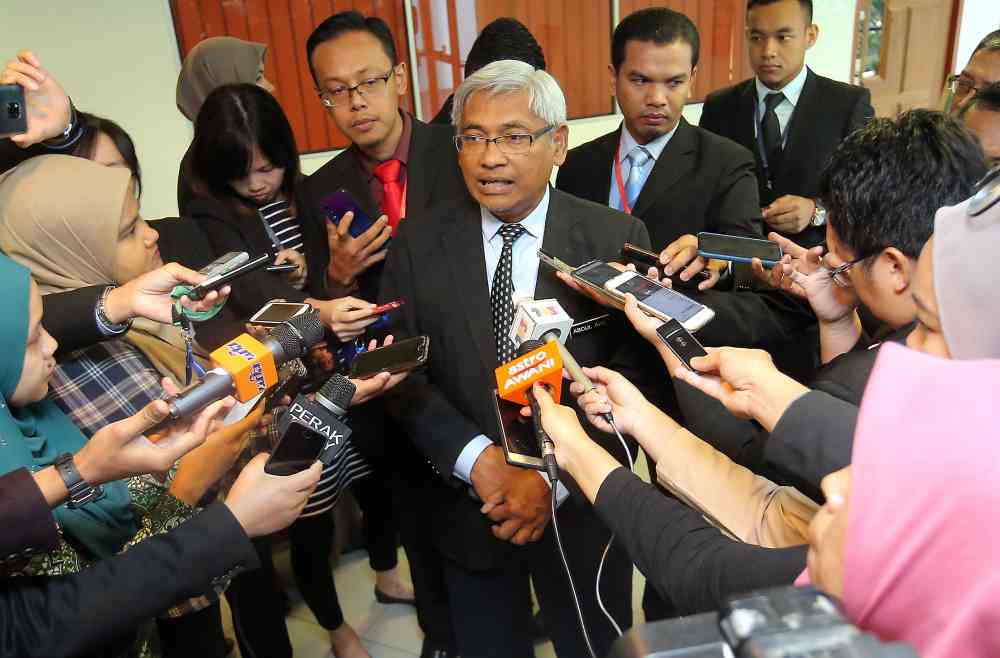 Perak state executive councillor Abdul Aziz Bari speaks to reporters in Ipoh April 18,2019. u00e2u20acu2022 Picture by Farhan Najib