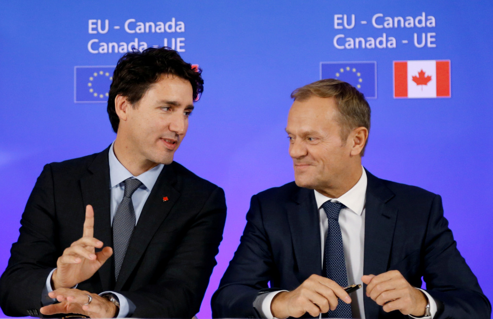 Canadau00e2u20acu2122s Prime Minister Justin Trudeau and European Council President Donald Tusk attend the signing ceremony of the Comprehensive Economic and Trade Agreement (Ceta), at the European Council in Brussels, Belgium, October 30, 2016. u00e2u20acu201d Reuters pic 
