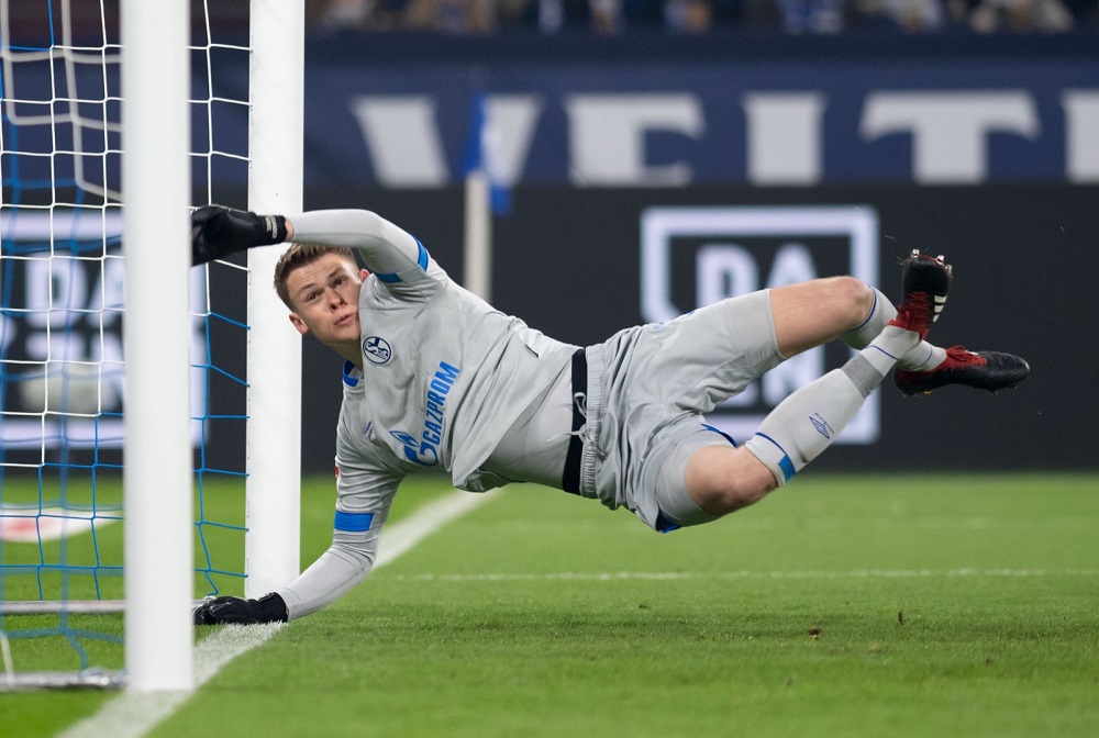 Schalke's German goalkeeper Alexander Nuebel dives during the German first division Bundesliga football match between FC Schalke 04 and VfL Wolfsburg in Gelsenkirchen January 20, 2019. u00e2u20acu201d AFP pic