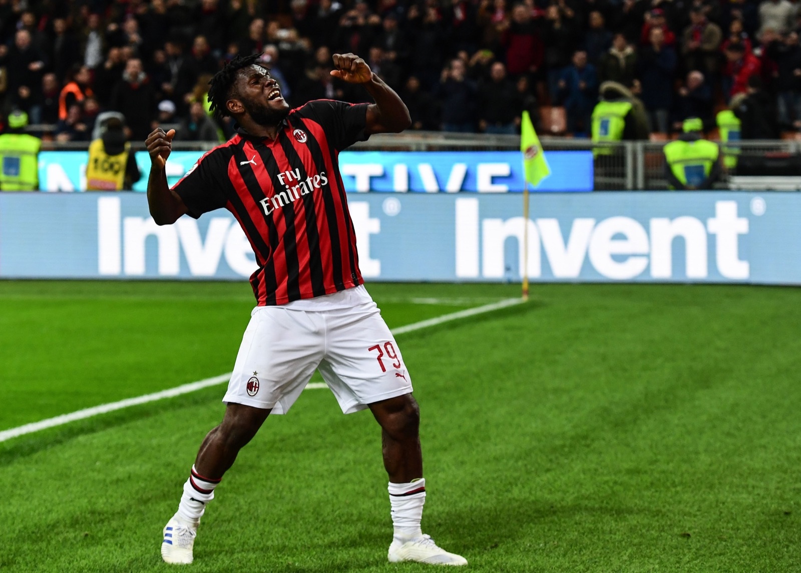 AC Milan's Franck Kessie celebrates after scoring a penalty during the Italian Serie A football match AC Milan vs Lazio Rome at the San Siro stadium in Milan April 13, 2019. u00e2u20acu201d AFP pic