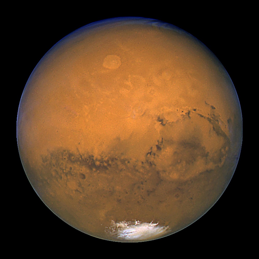 This file handout image made from a series of exposures, released by Nasau00e2u20acu2122s Hubble Space Telescope on August 27, 2003 shows Mars snapped within minutes of the planetu00e2u20acu2122s closest approach to Earth in nearly 60,000 years. u00e2u20acu201d AFP pic