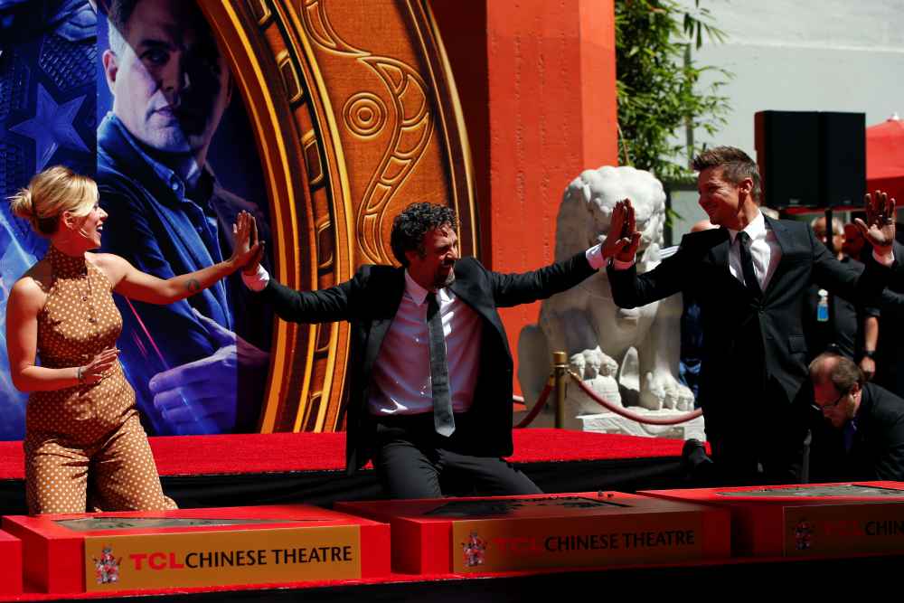 Actors Scarlett Johansson, Mark Ruffalo and Jeremy Renner react after placing their handprints in cement at a ceremony at the TCL Chinese Theatre in Hollywood, Los Angeles April 23, 2019. u00e2u20acu2022 Reuters pic