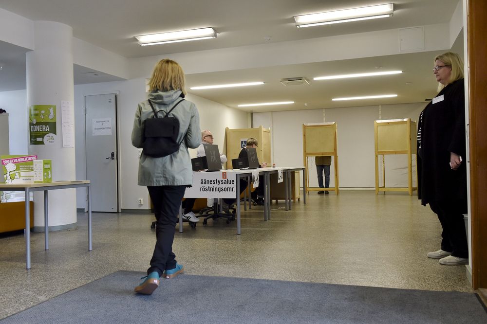 A woman is seen at a polling station during voting for the parliamentary elections, in Helsinki, Finland April 14, 2019. u00e2u20acu201d Lehtikuva/Emmi Korhonen picture via Reuters