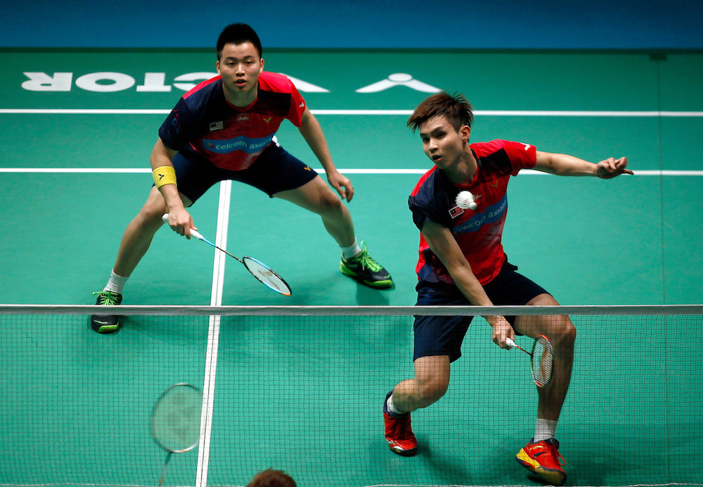 Aaron Chia and Soh Wooi Yik in action against Japanu00e2u20acu2122s Takuro Hoki and Yugo Kobayashi in the second round of the 2019 Malaysian Open at Axiata Arena in Bukit Jalil, Kuala Lumpur April 4, 2019. u00e2u20acu201d Bernama pic