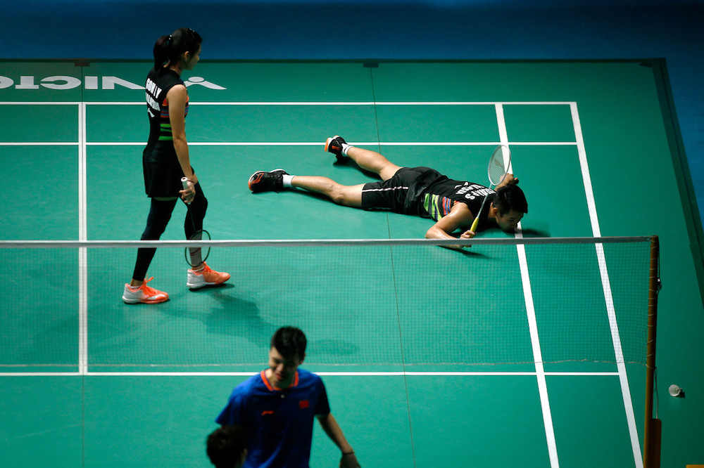 Malaysiau00e2u20acu2122s Chan Peng Soon and Goh Liu Ying in action against Chinau00e2u20acu2122s Wang Yilyu-Huang Dongping during the 2019 Malaysian Open at Axiata Arena in Bukit Jalil April 5, 2019. u00e2u20acu201d Bernama pic
